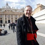 German Cardinal Kasper smiles after first day of meeting with College of Cardinals at Vatican